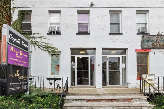 a view of a building with a window and door