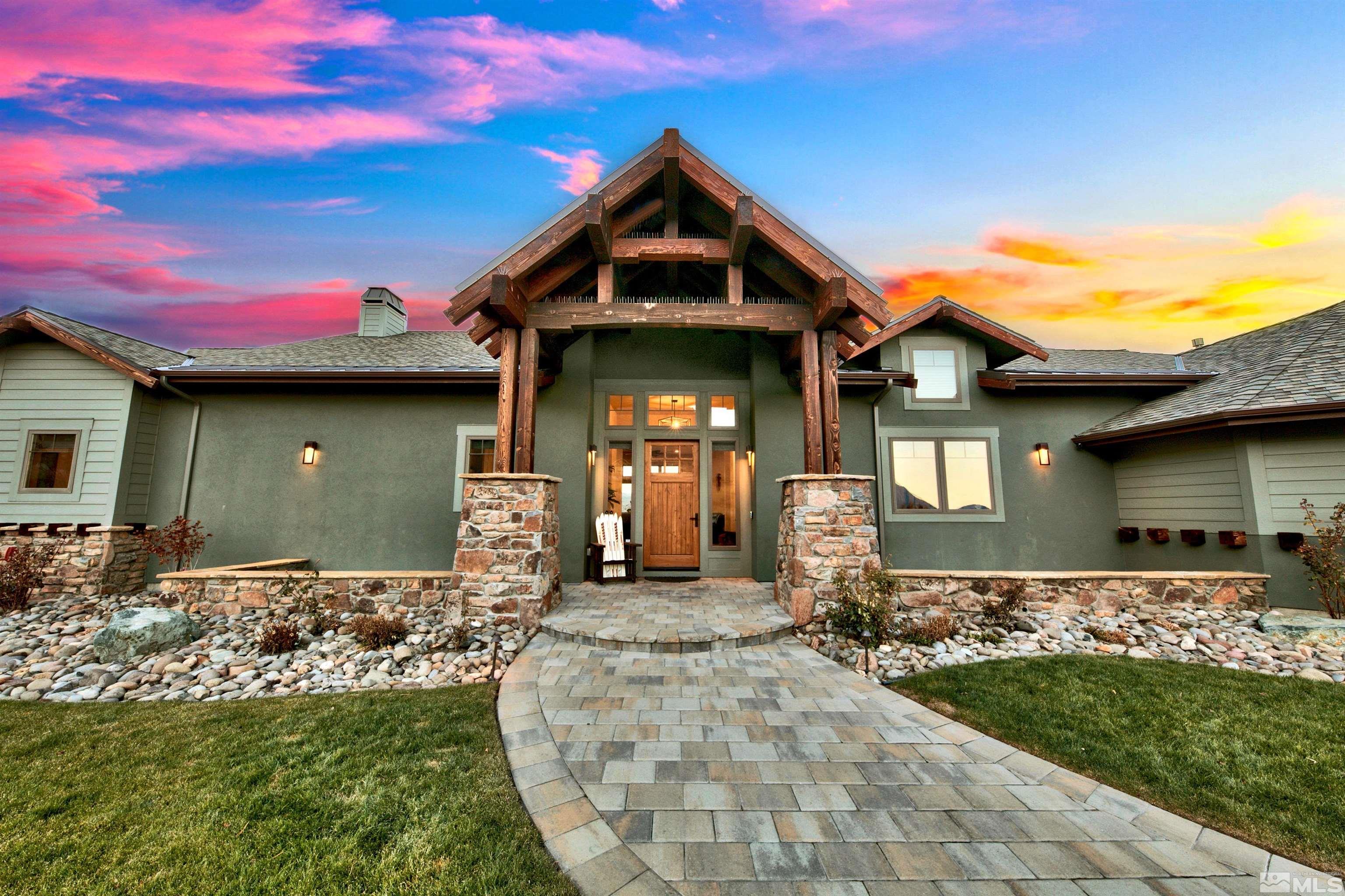 316 James Canyon Loop Genoa, NV 89411 - Photo 2 of 40 a front view of a house with a yard