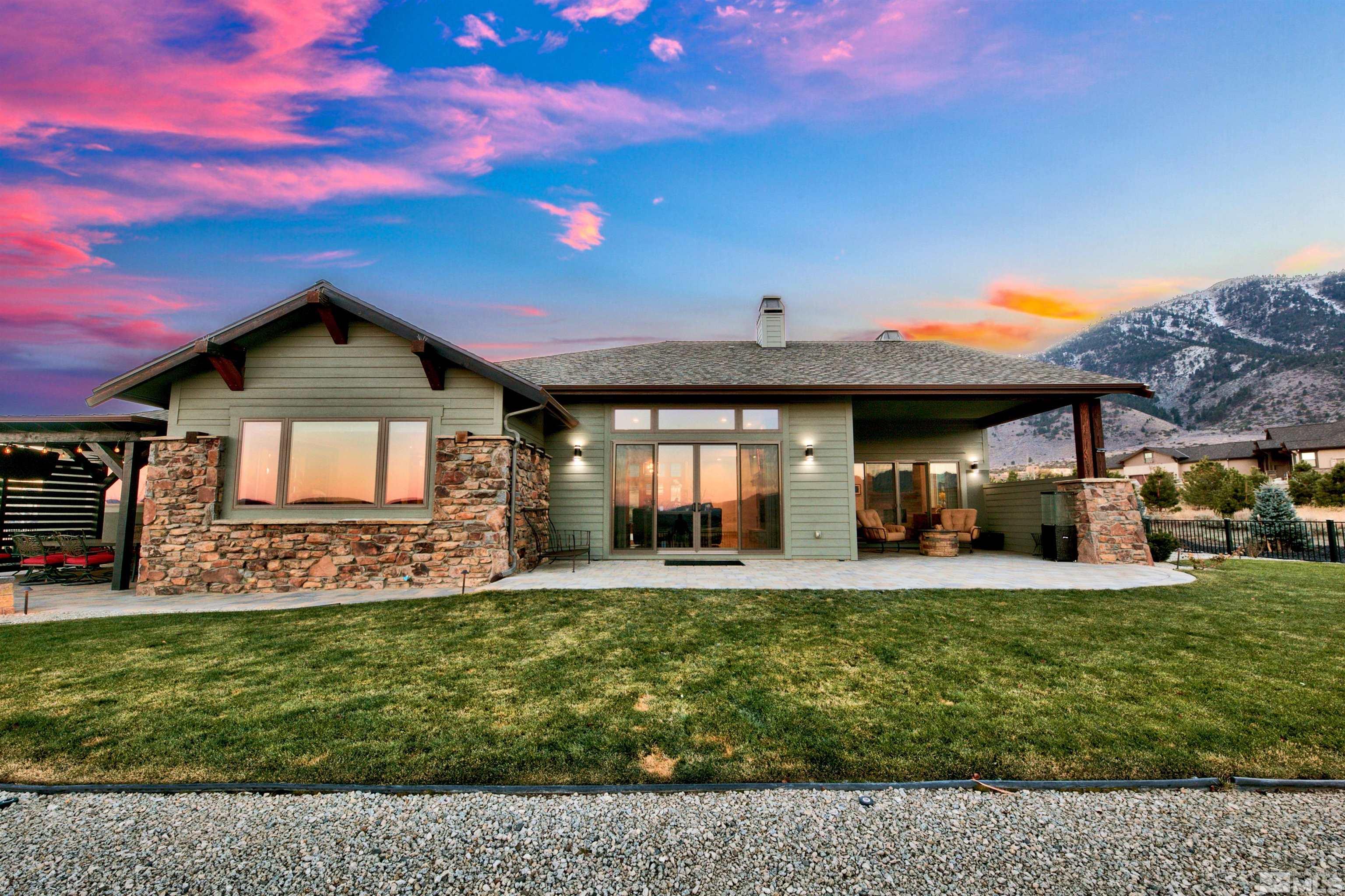 316 James Canyon Loop Genoa, NV 89411 - Photo 25 of 40 a view of a house with a big yard and sitting area