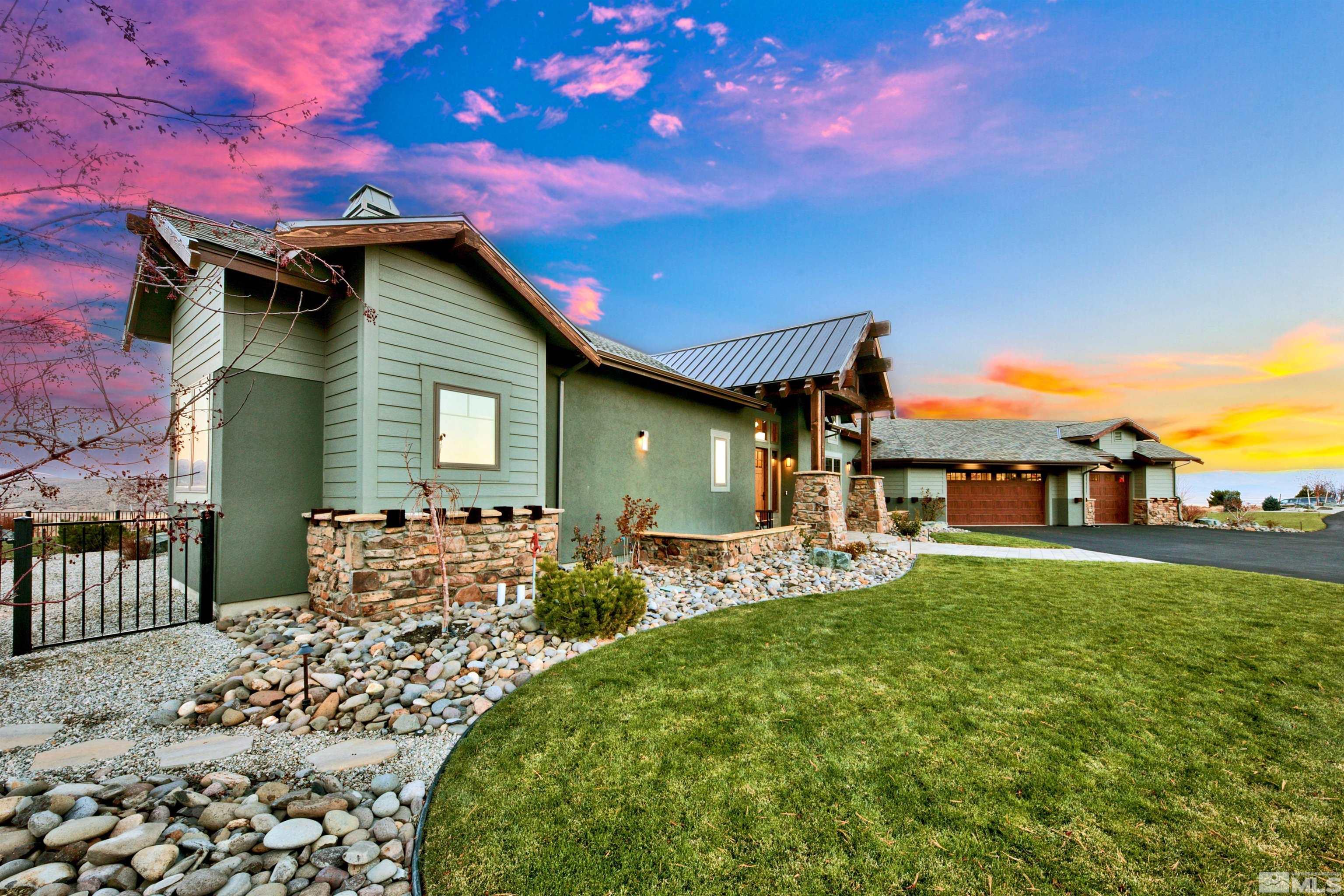 316 James Canyon Loop Genoa, NV 89411 - Photo 3 of 40 a front view of a house with garden
