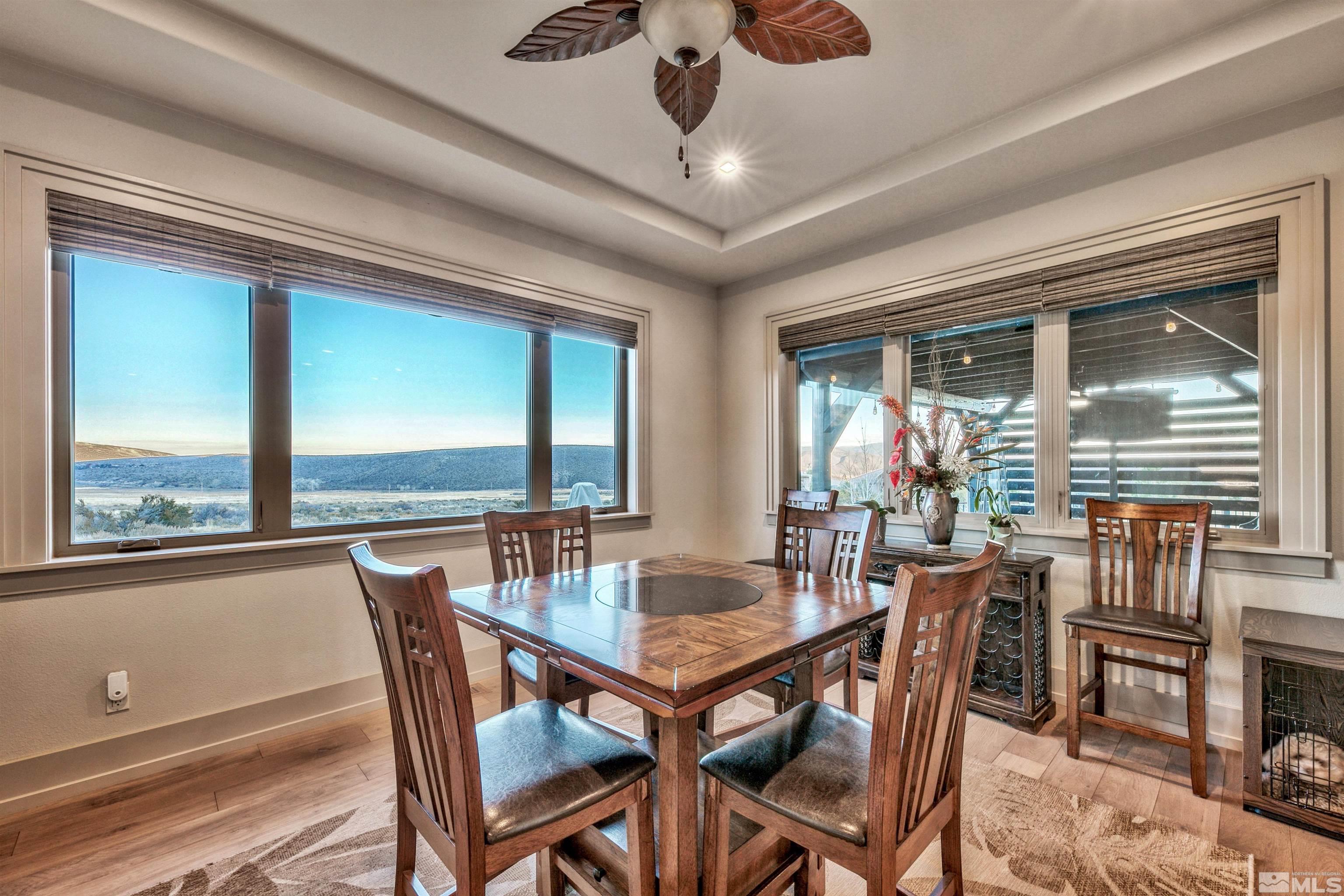 316 James Canyon Loop Genoa, NV 89411 - Photo 9 of 40 a view of a dining room with furniture window and outside view