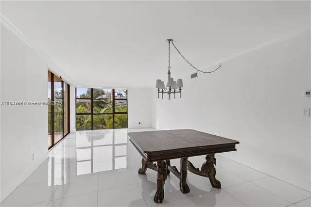 a view of a livingroom with furniture and window