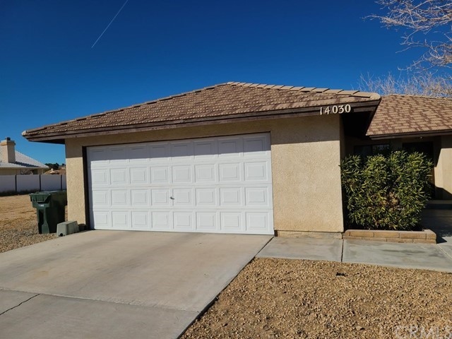 a view of a house with a garage