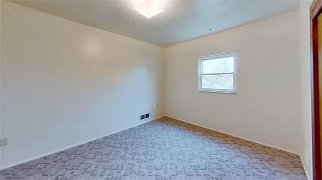 an empty room with a workbench