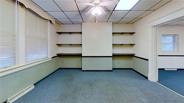 a room with furniture and window