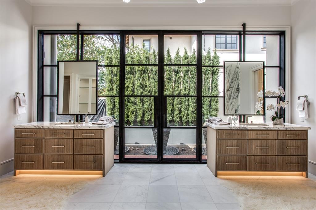 4306 Gloster Road Dallas, TX 75220 - Photo 18 of 28 a spacious bathroom with a tub and a sink