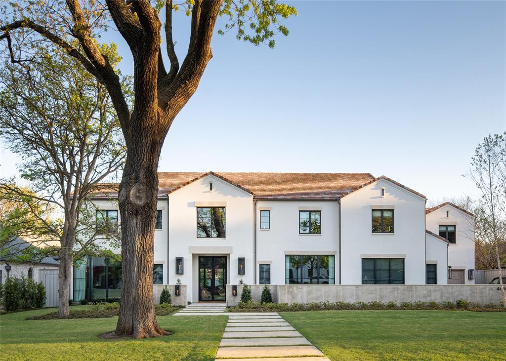 4306 Gloster Road Dallas, TX 75220 - Photo 2 of 28 a front view of a house with a yard