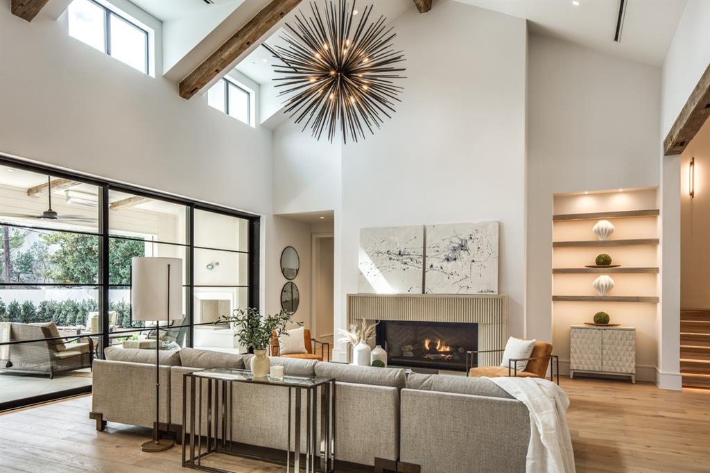 4306 Gloster Road Dallas, TX 75220 - Photo 5 of 28 a living room with furniture and a fireplace