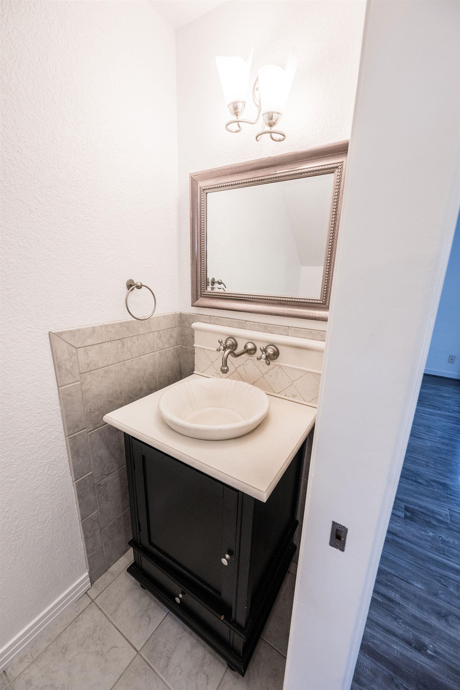 2721 Patterson Road, Unit 104 Grand Junction, CO 81506 - Photo 9 of 20 a bathroom with a sink vanity and mirror