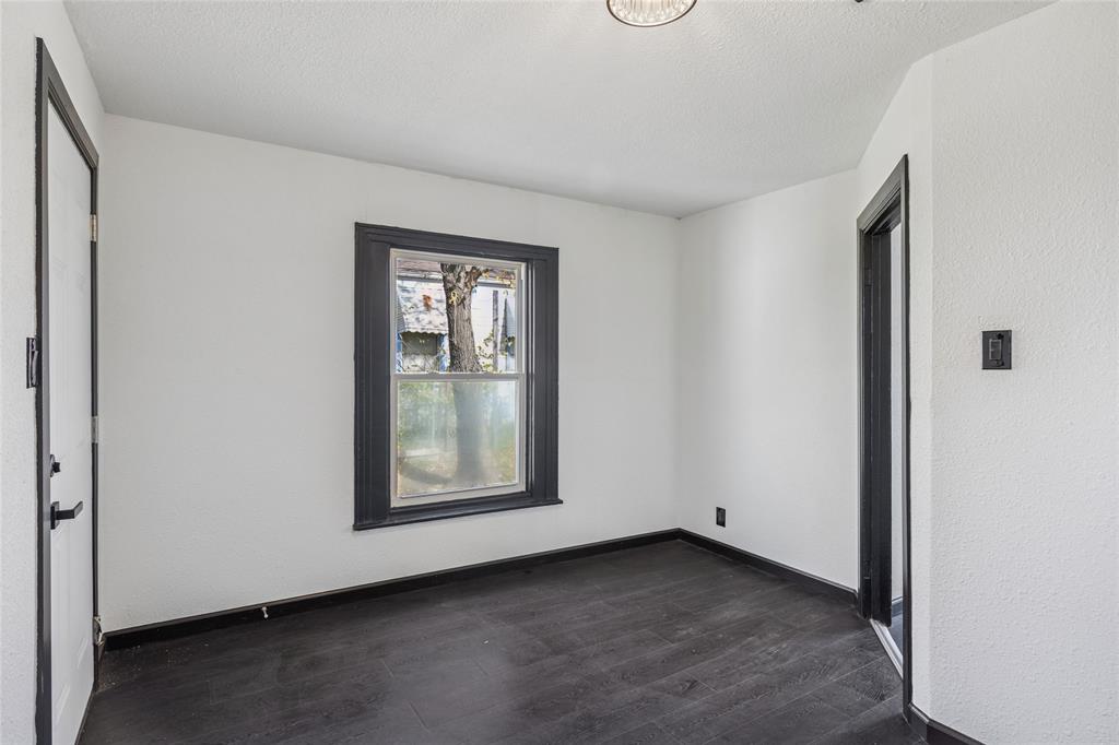 4816 Foard Street Fort Worth, TX 76119 - Photo 11 of 25 an empty room with a window