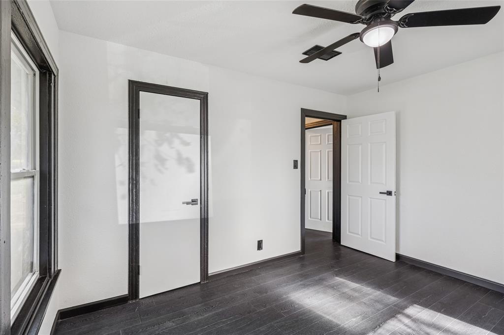 4816 Foard Street Fort Worth, TX 76119 - Photo 16 of 25 a view of an empty room and wooden floor