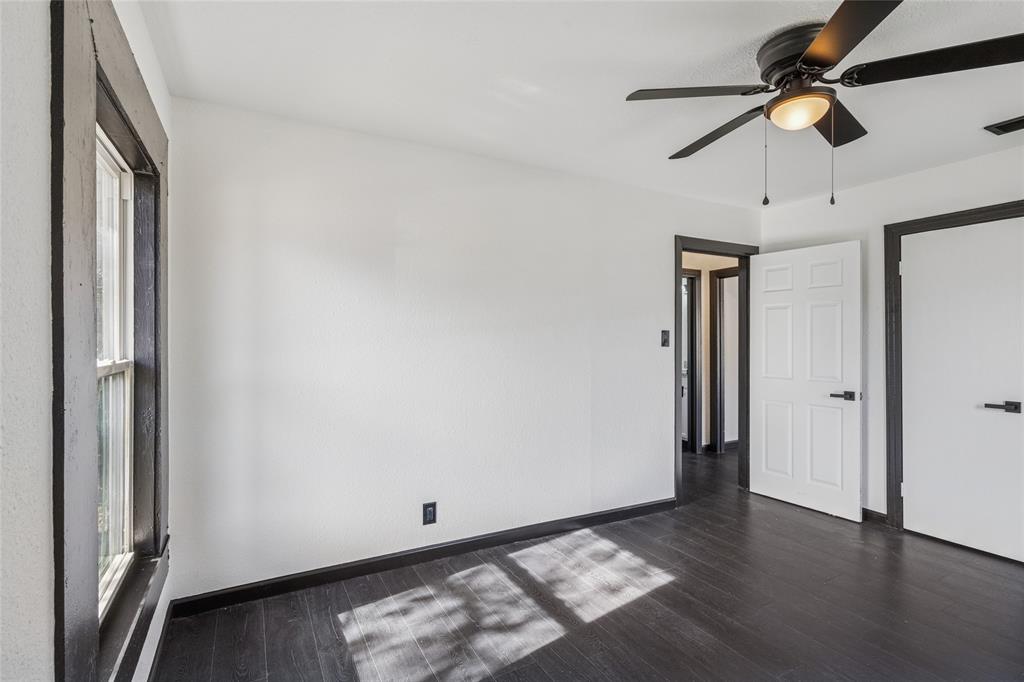 4816 Foard Street Fort Worth, TX 76119 - Photo 19 of 25 a view of an empty room and wooden floor
