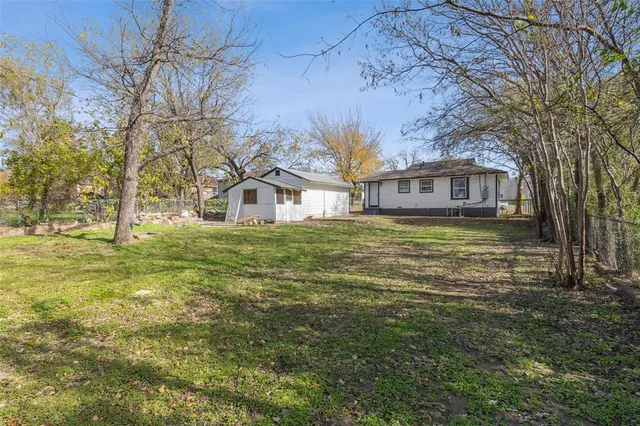 a view of a yard with a trees