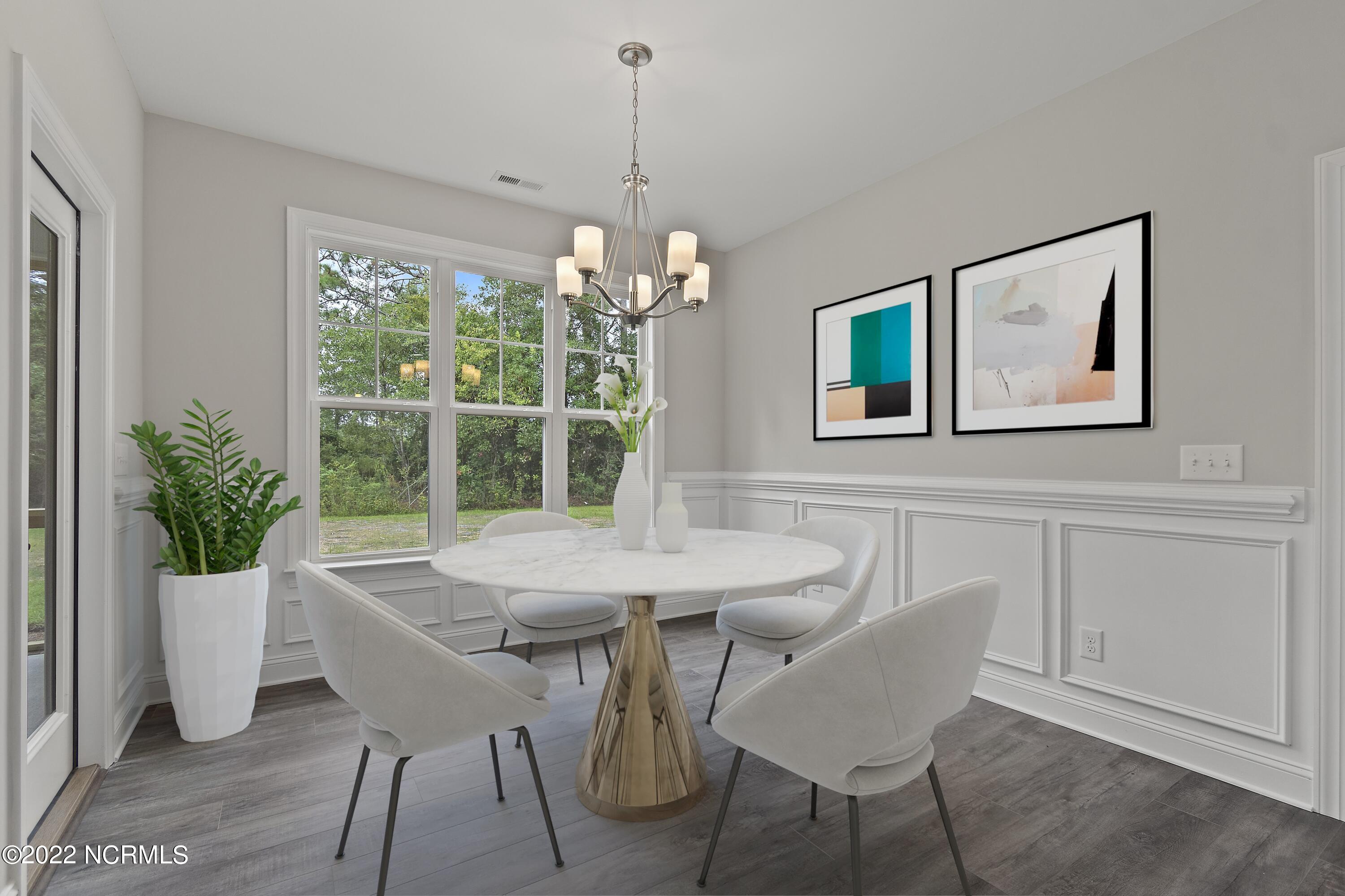 2010 Albemarle Road Southport, NC 28461 - Photo 6 of 44 Virtually staged dining room picture.