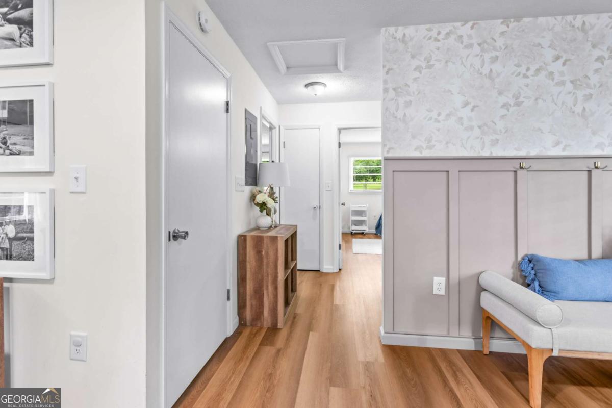 764 Sandy Cross Road Lexington, GA 30648 - Photo 24 of 52 a view of hallway with wooden floor