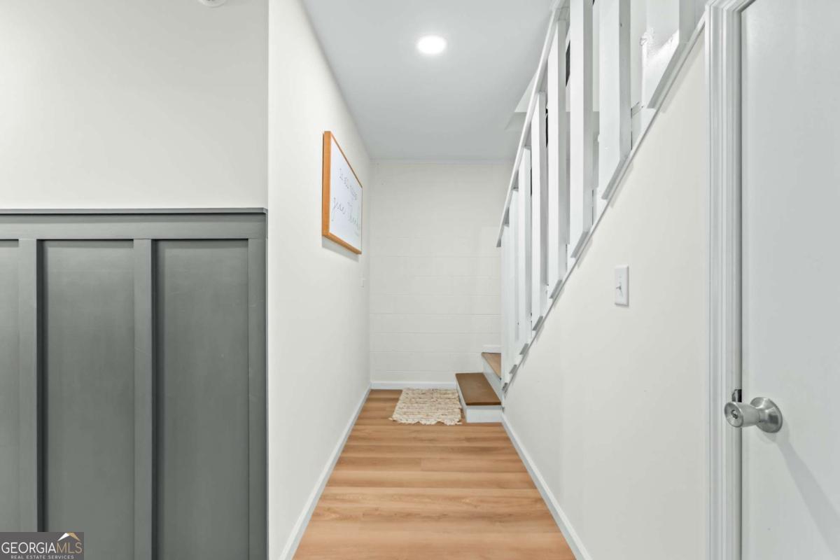 764 Sandy Cross Road Lexington, GA 30648 - Photo 33 of 52 a view of a hallway with stairs