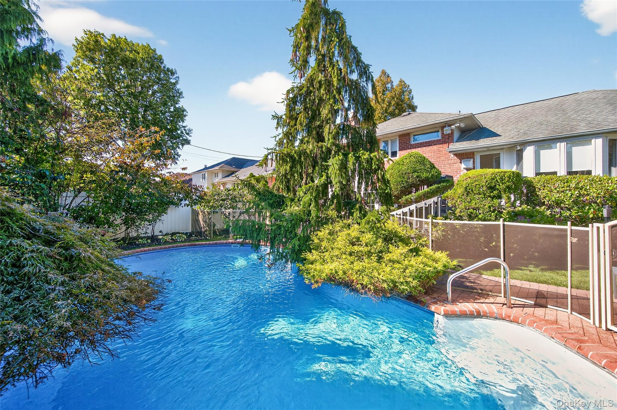 11 Sunbeam Road Syosset, NY 11791 - Photo 22 of 28 Backyard: In-ground heated saltwater swimming pool