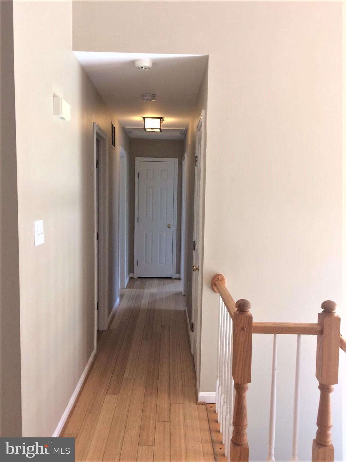 316 Oakwood Road Edgewater, MD 21037 - Photo 11 of 39 Take the ctr Hallway off LR to upper lvl BRs/BAs