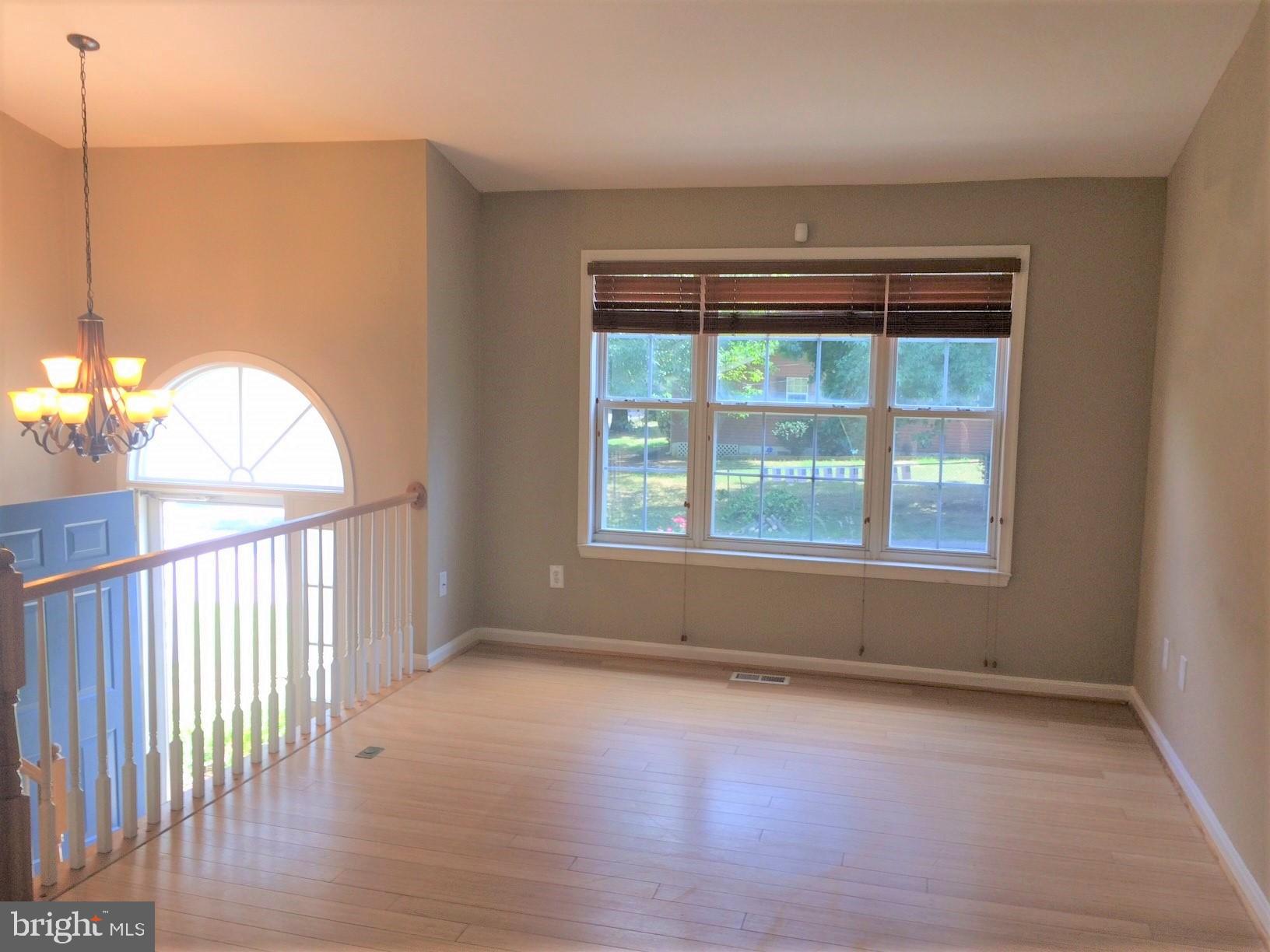 316 Oakwood Road Edgewater, MD 21037 - Photo 3 of 39 Beautiful hardwood in the LR, DR, and Kitchen