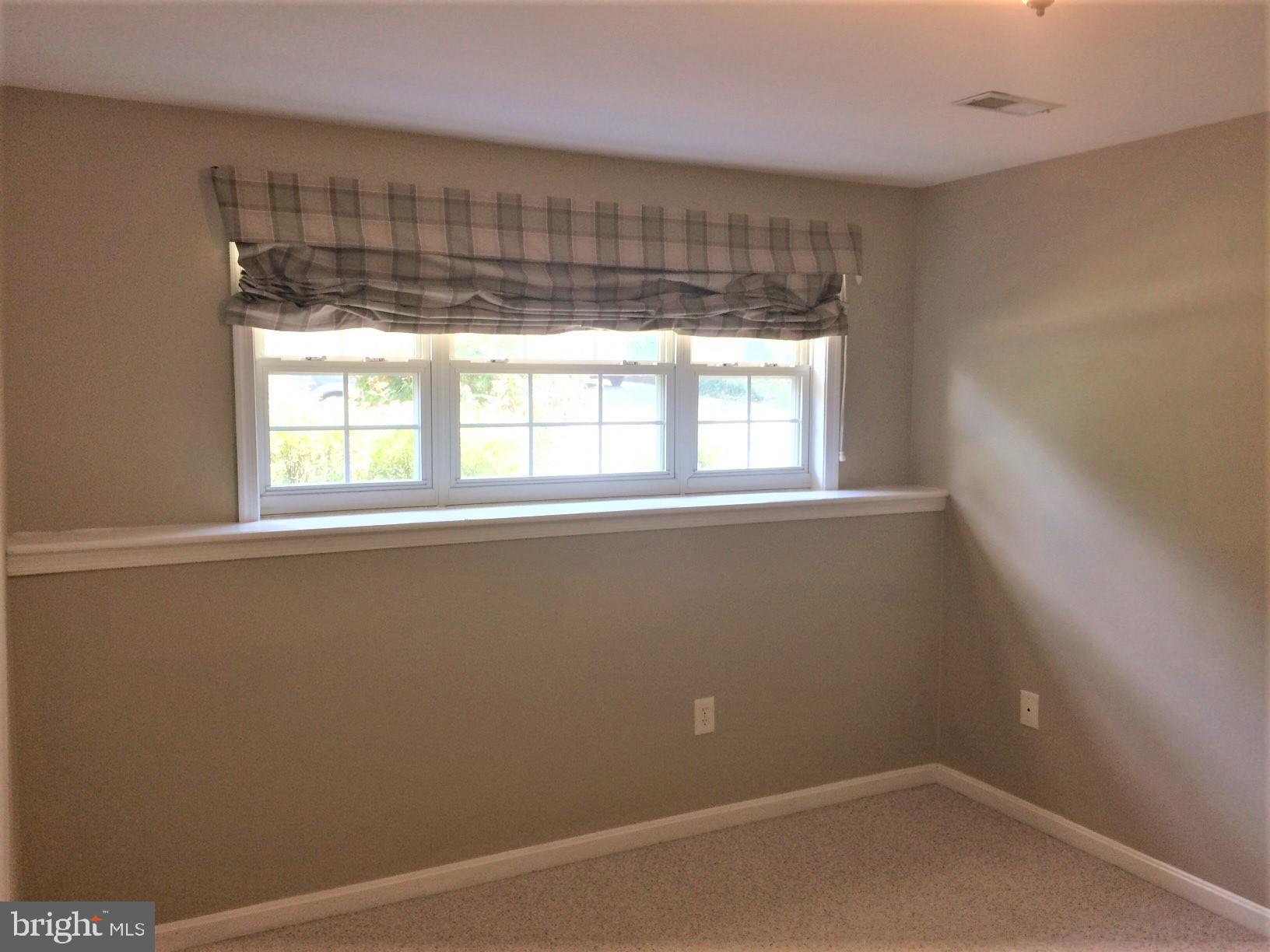 316 Oakwood Road Edgewater, MD 21037 - Photo 24 of 39 BR 4 is to the left of the stairs w/triple window