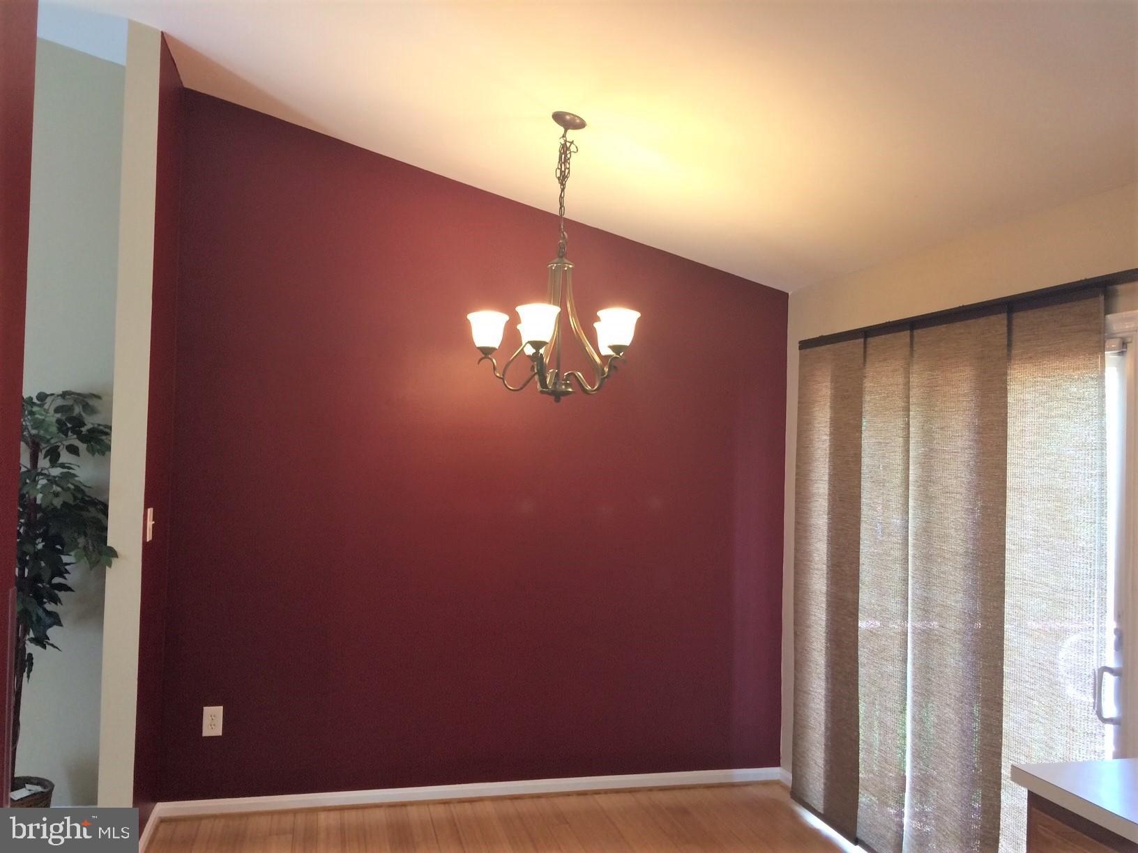 316 Oakwood Road Edgewater, MD 21037 - Photo 5 of 39 DR features a vaulted ceiling + access to Deck