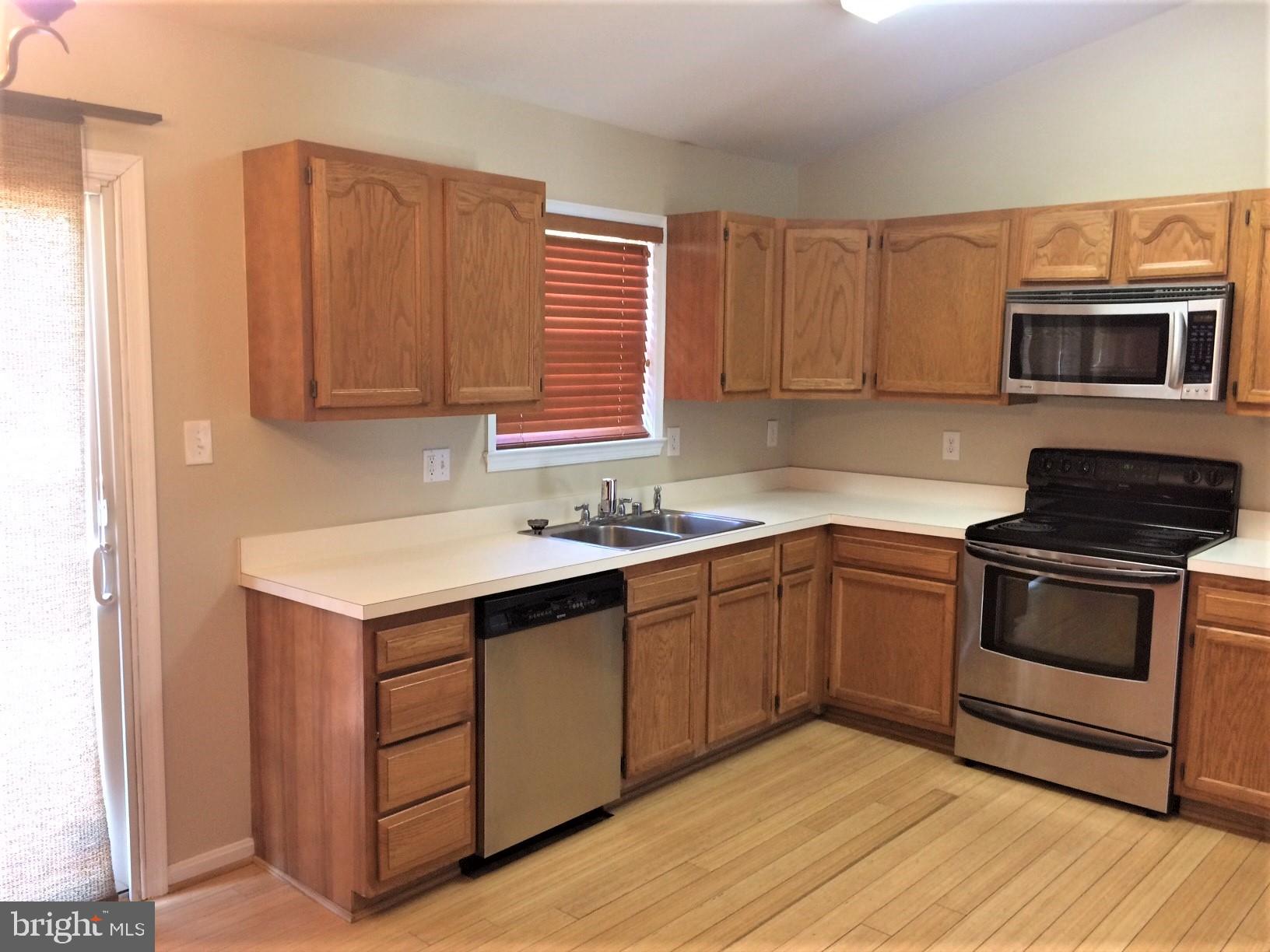 316 Oakwood Road Edgewater, MD 21037 - Photo 9 of 39 The Kitchen offers ample cabs + counter space