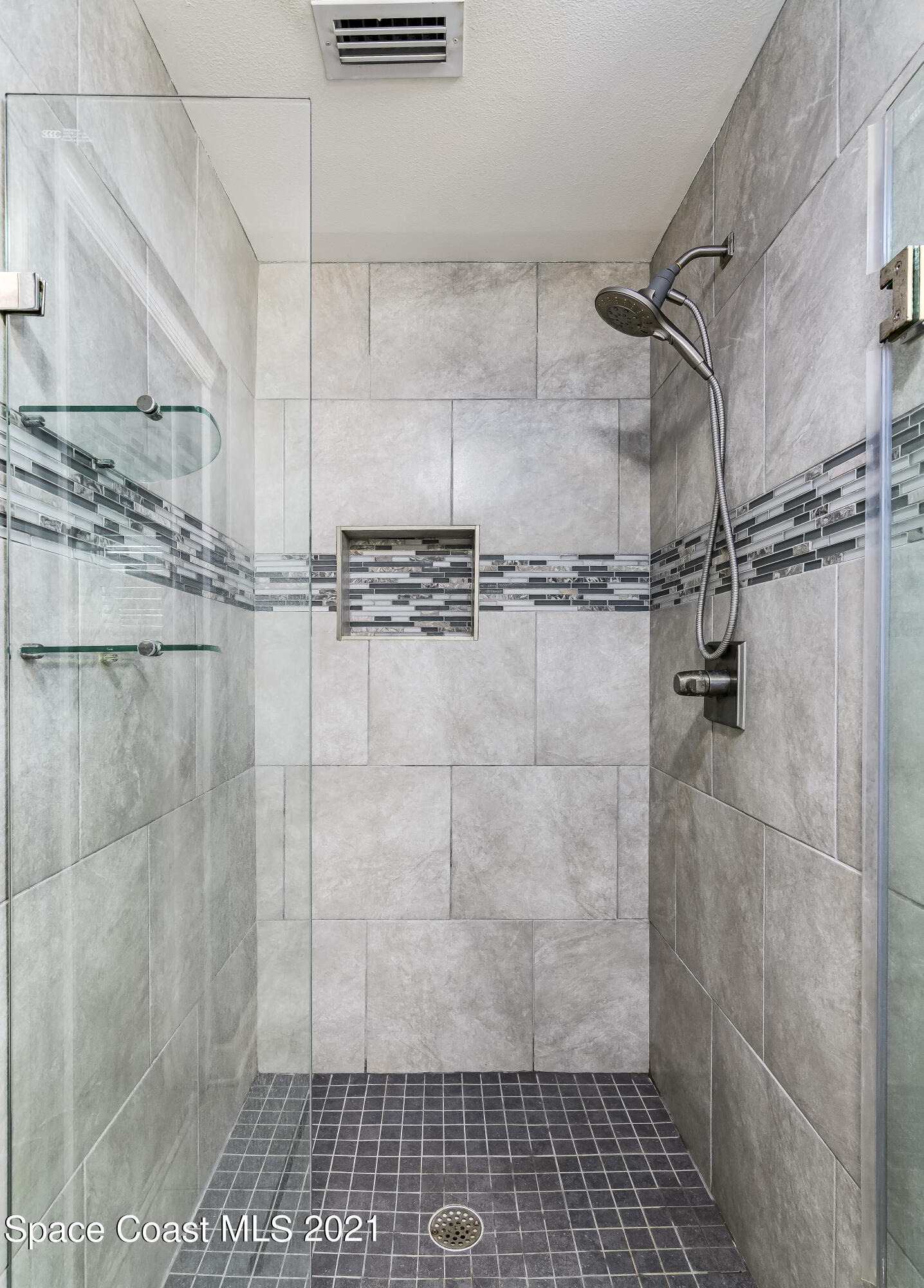 1740 Vally Road Malabar, FL 32950 - Photo 12 of 42 a bathroom with a shower