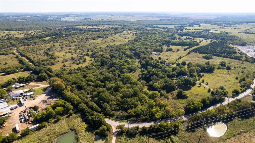 2400 Lasater Road Seagoville, TX 75159 - Photo 2 of 8 an aerial view of a residential houses and city view