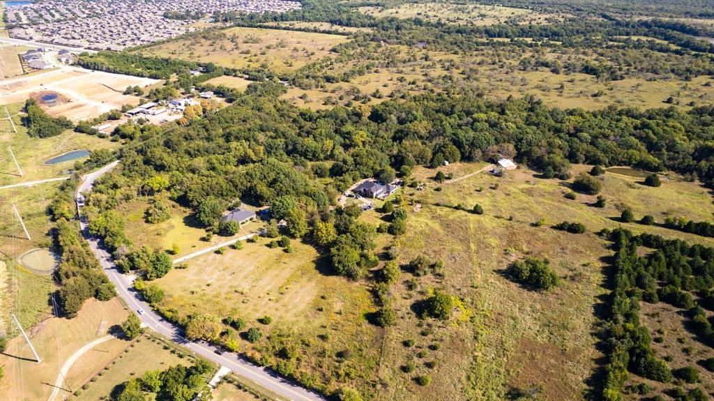 2400 Lasater Road Seagoville, TX 75159 - Photo 6 of 8 a view of a yard of the snow