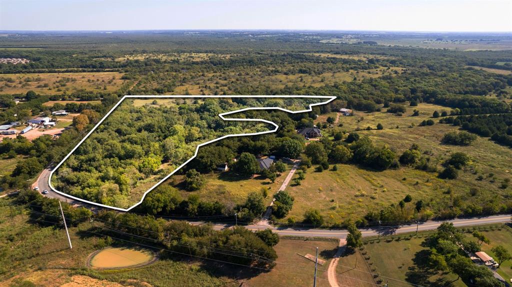 2400 Lasater Road Seagoville, TX 75159 - Photo 7 of 8 an aerial view of a residential houses with outdoor space