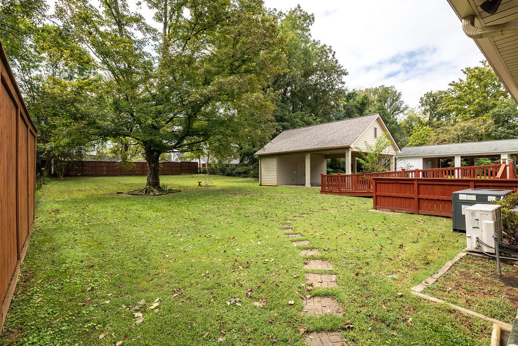 439 East Madison Street Pulaski, TN 38478 - Photo 6 of 36 a view of a house with backyard
