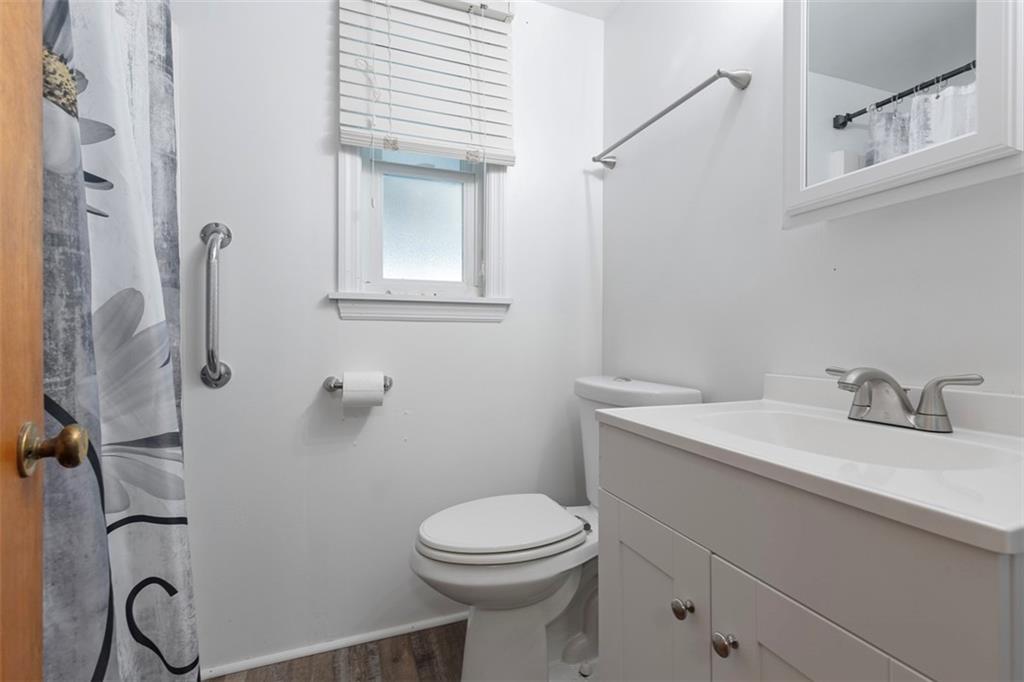 7826 Noblestown Road McDonald, PA 15057 - Photo 15 of 48 a bathroom with a sink a toilet and a mirror