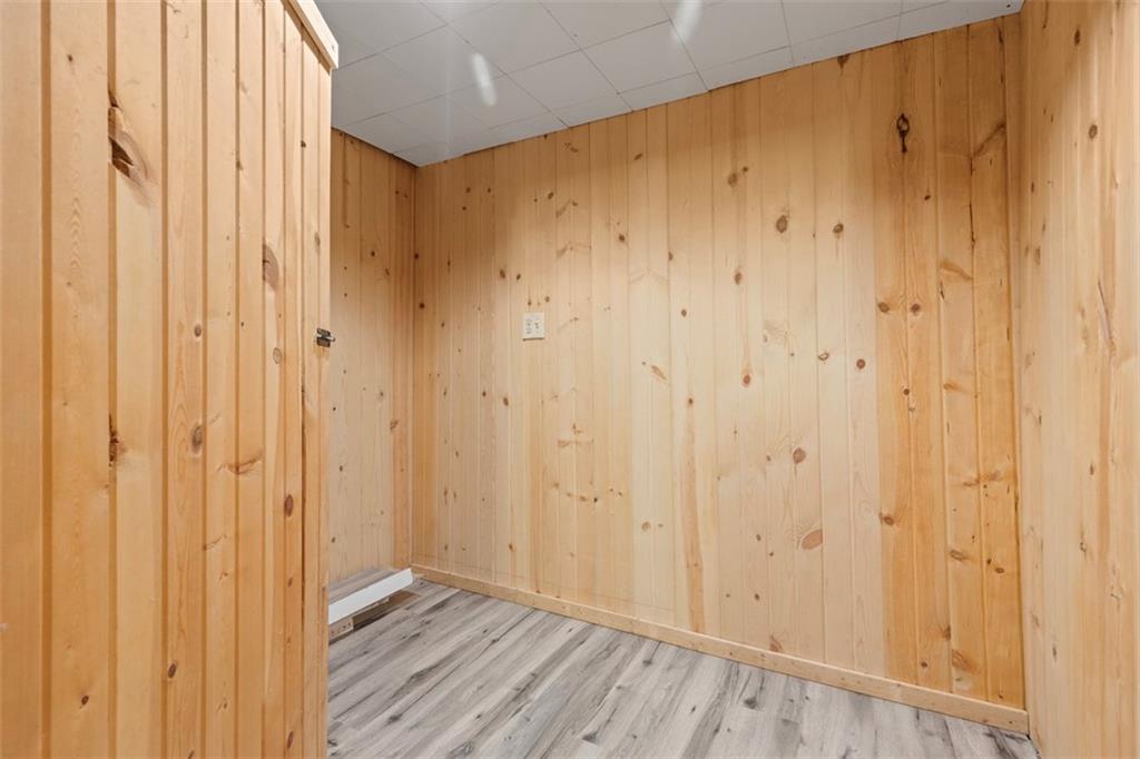 7826 Noblestown Road McDonald, PA 15057 - Photo 23 of 48 a view of a hallway with wooden floor