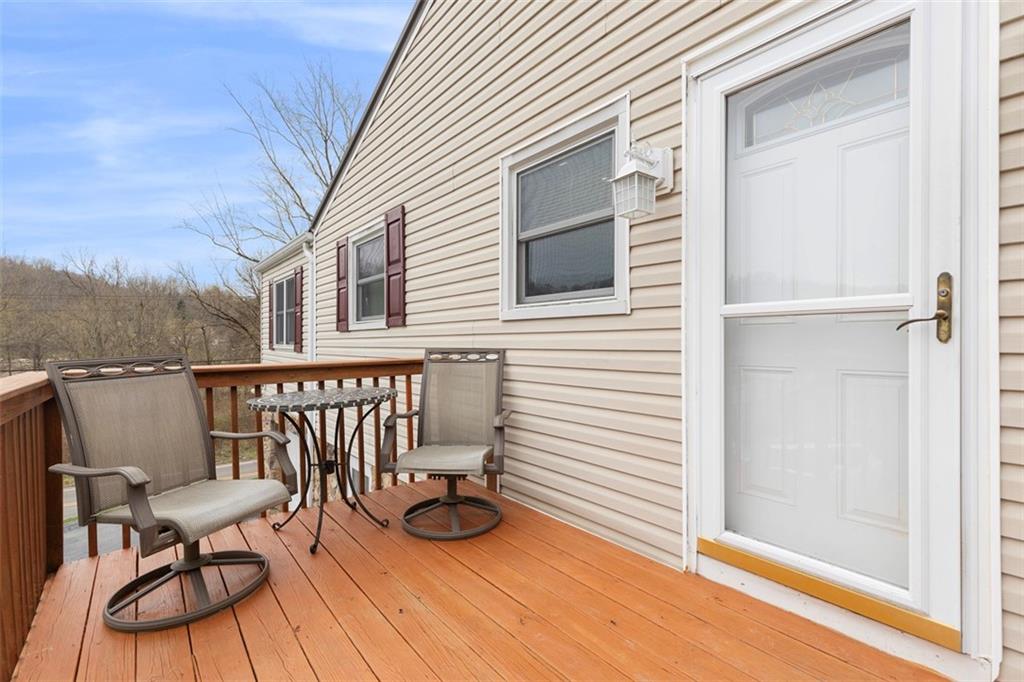 7826 Noblestown Road McDonald, PA 15057 - Photo 25 of 48 a view of a chair and tables in the balcony