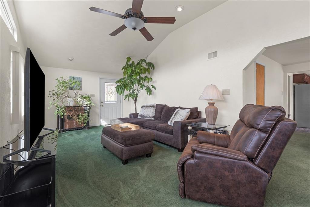 7826 Noblestown Road McDonald, PA 15057 - Photo 3 of 48 a living room with furniture and a flat screen tv