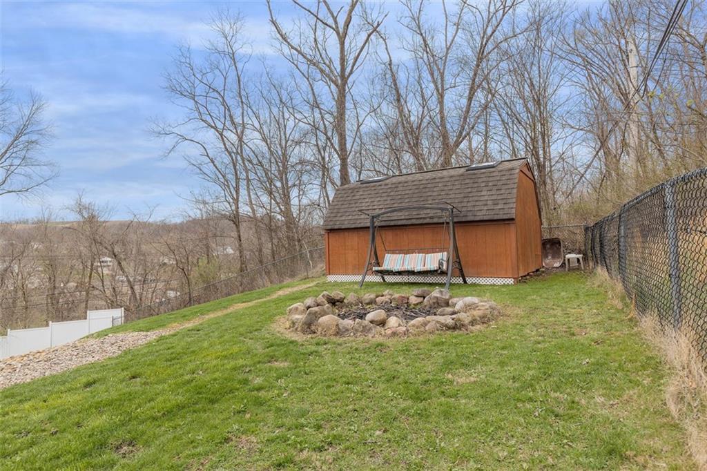 7826 Noblestown Road McDonald, PA 15057 - Photo 37 of 48 a backyard of a house with table and chairs