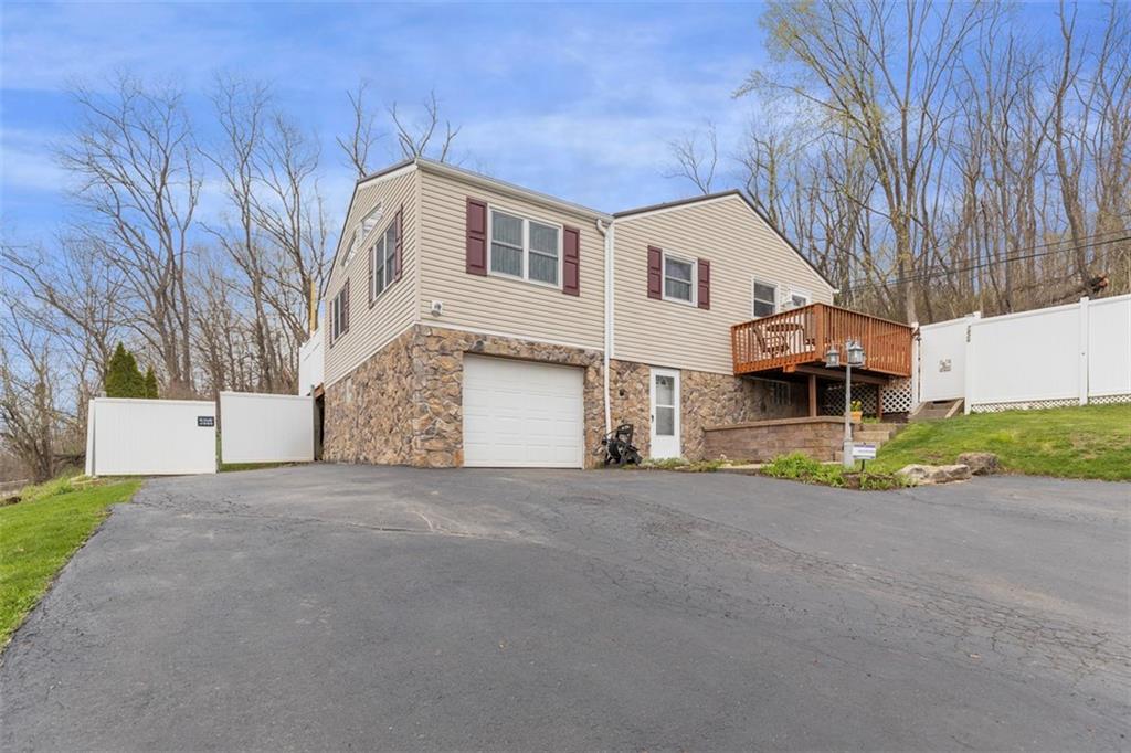 7826 Noblestown Road McDonald, PA 15057 - Photo 40 of 48 a view of a house with a yard and garage