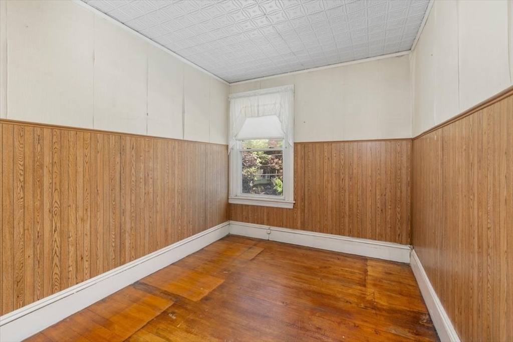 98 Webster Street Haverhill, MA 01830 - Photo 17 of 42 a view of an empty room with a window