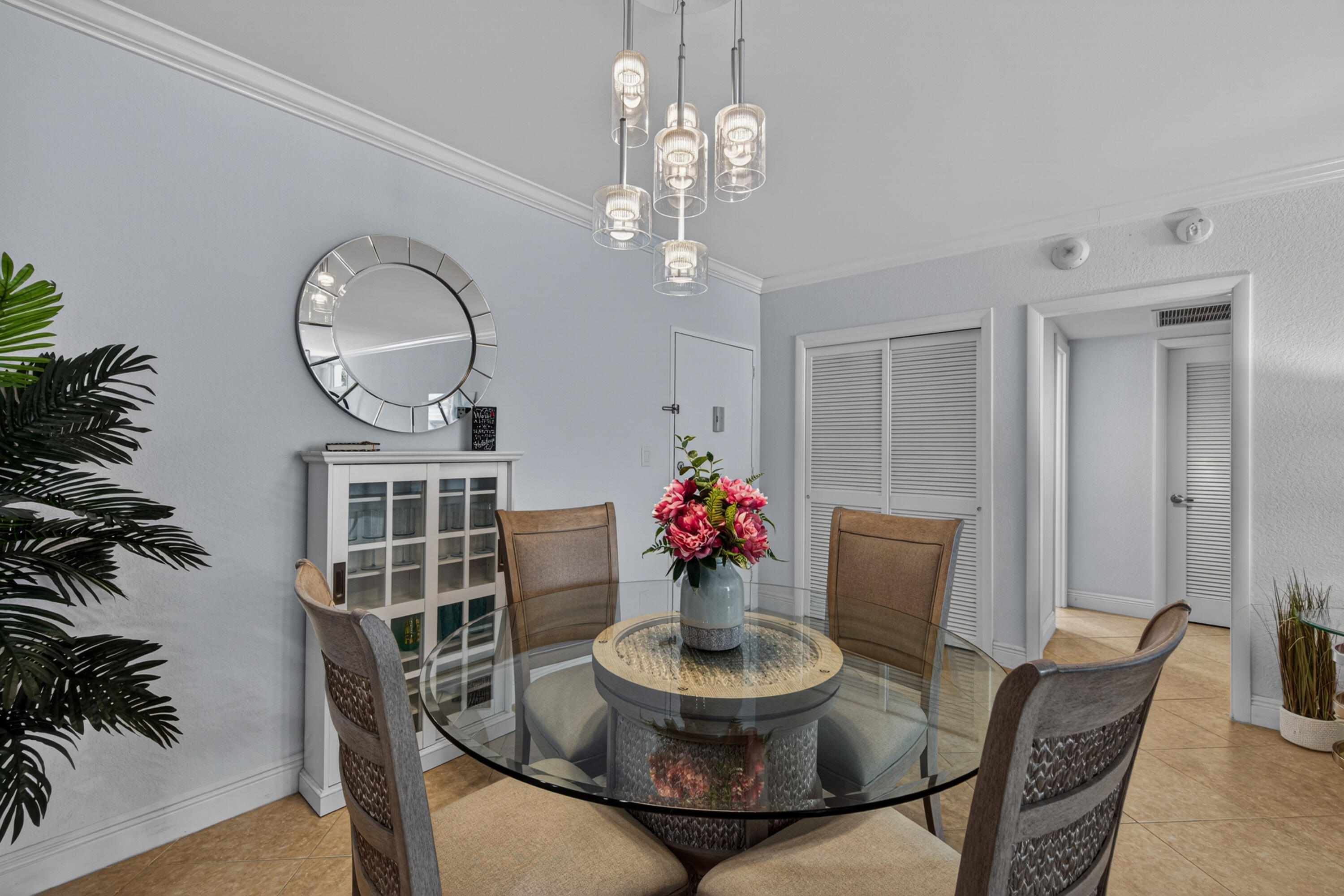 2851 South Ocean Boulevard, Unit 1N Boca Raton, FL 33432 - Photo 12 of 54 a view of a dining room with furniture and wooden floor