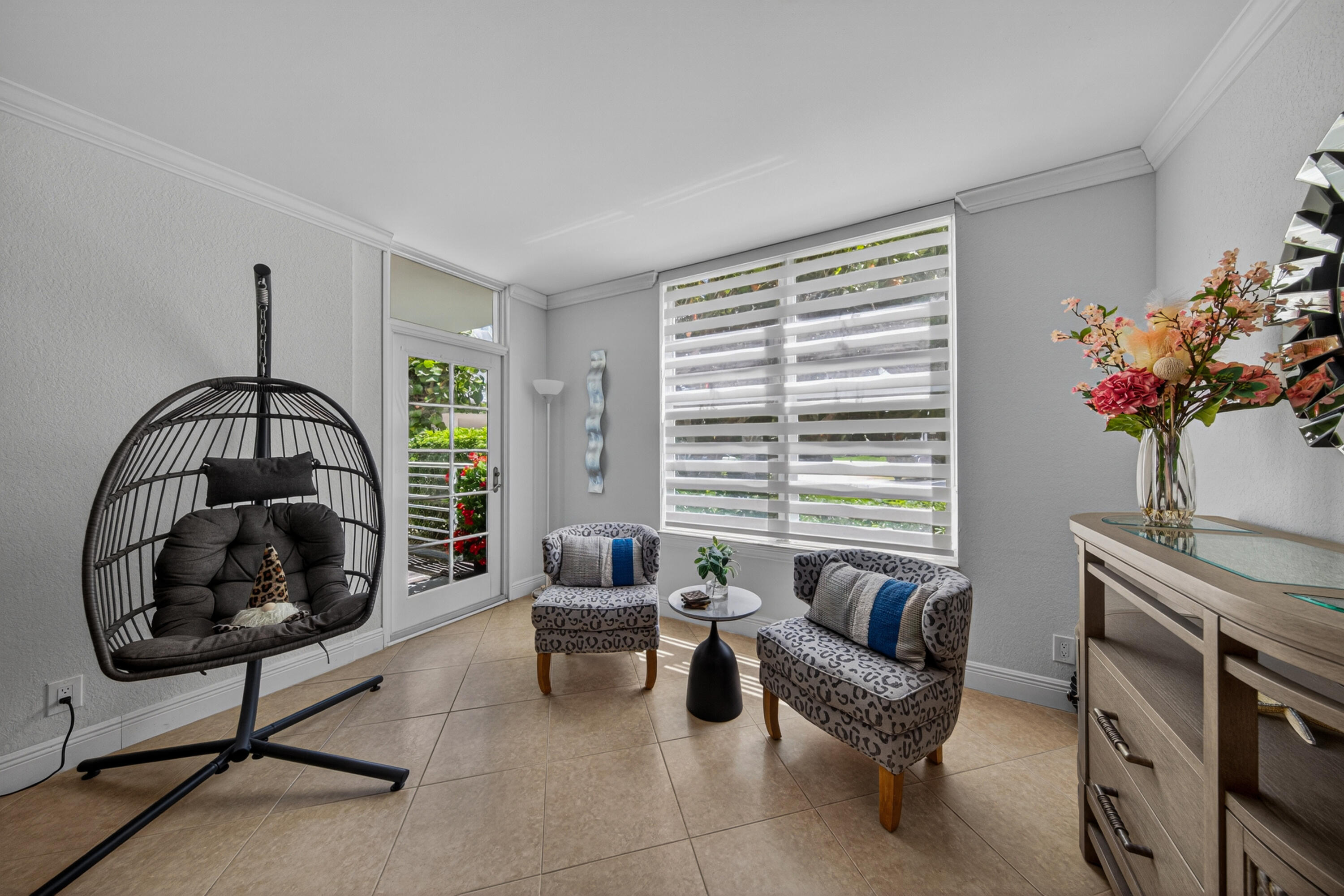 2851 South Ocean Boulevard, Unit 1N Boca Raton, FL 33432 - Photo 14 of 54 a living room with furniture and a window