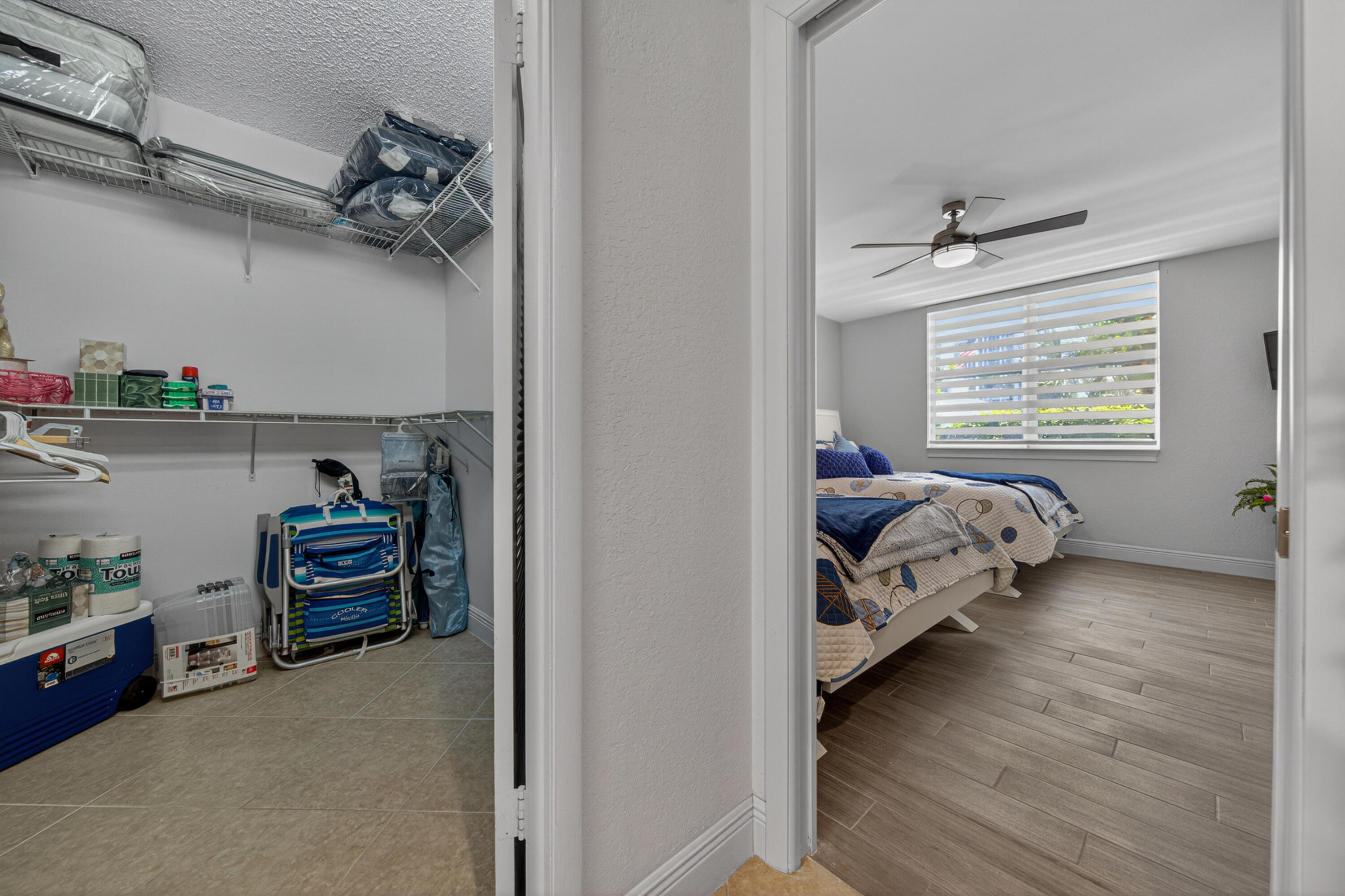 2851 South Ocean Boulevard, Unit 1N Boca Raton, FL 33432 - Photo 32 of 54 a bedroom with furniture and a window