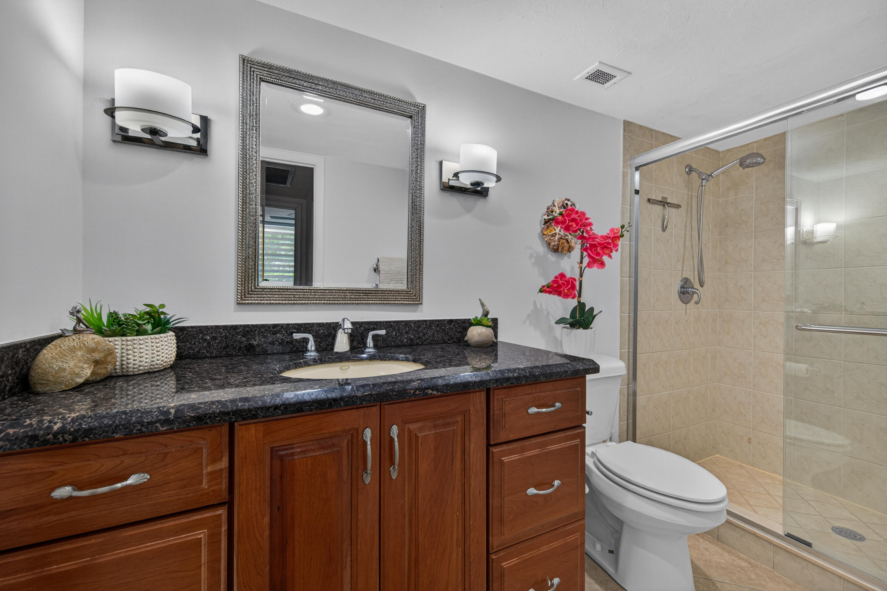 2851 South Ocean Boulevard, Unit 1N Boca Raton, FL 33432 - Photo 33 of 54 a bathroom with a granite countertop sink toilet and shower