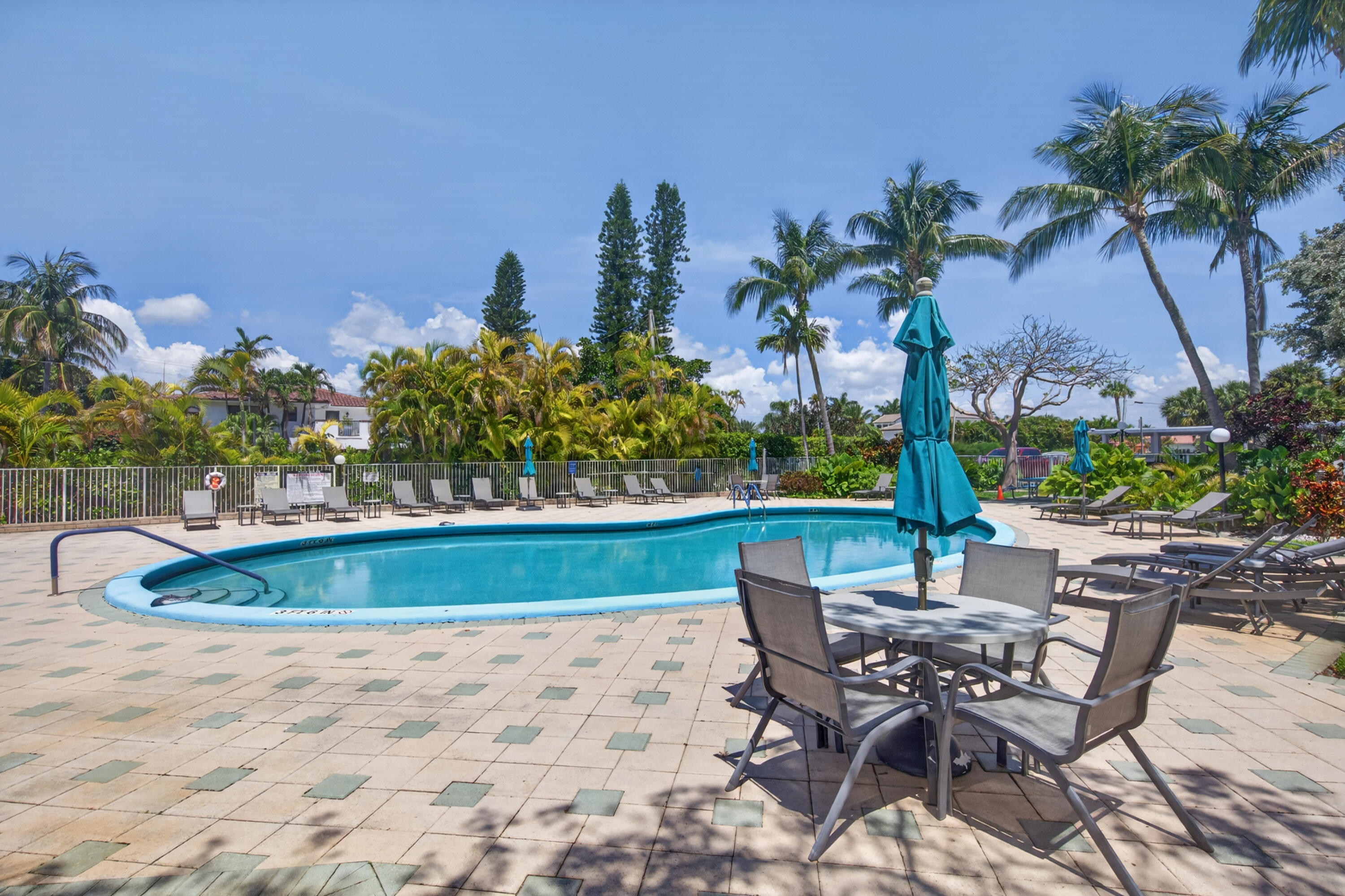 2851 South Ocean Boulevard, Unit 1N Boca Raton, FL 33432 - Photo 38 of 54 a view of a backyard with a sitting area