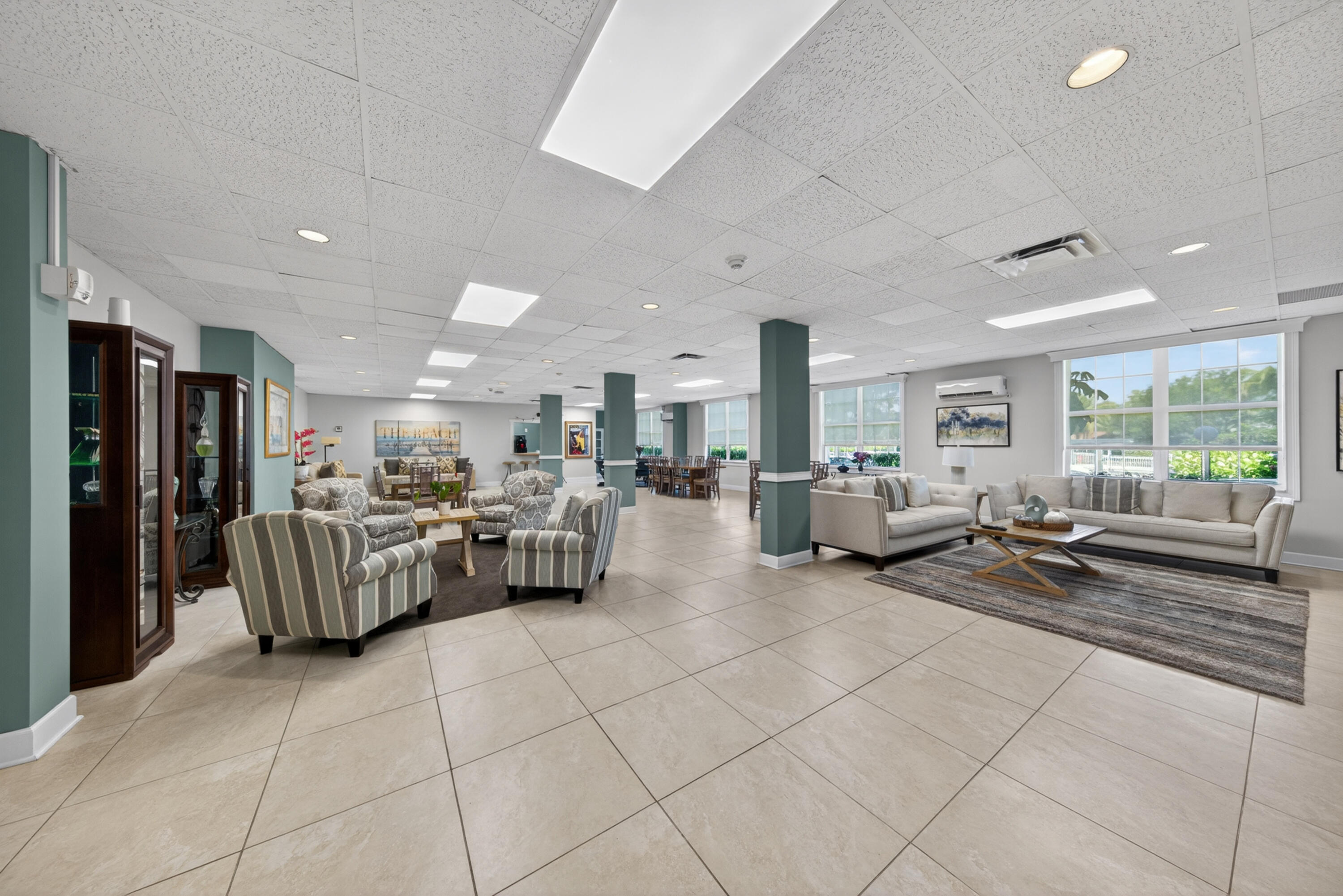 2851 South Ocean Boulevard, Unit 1N Boca Raton, FL 33432 - Photo 45 of 54 a living room with furniture and a table