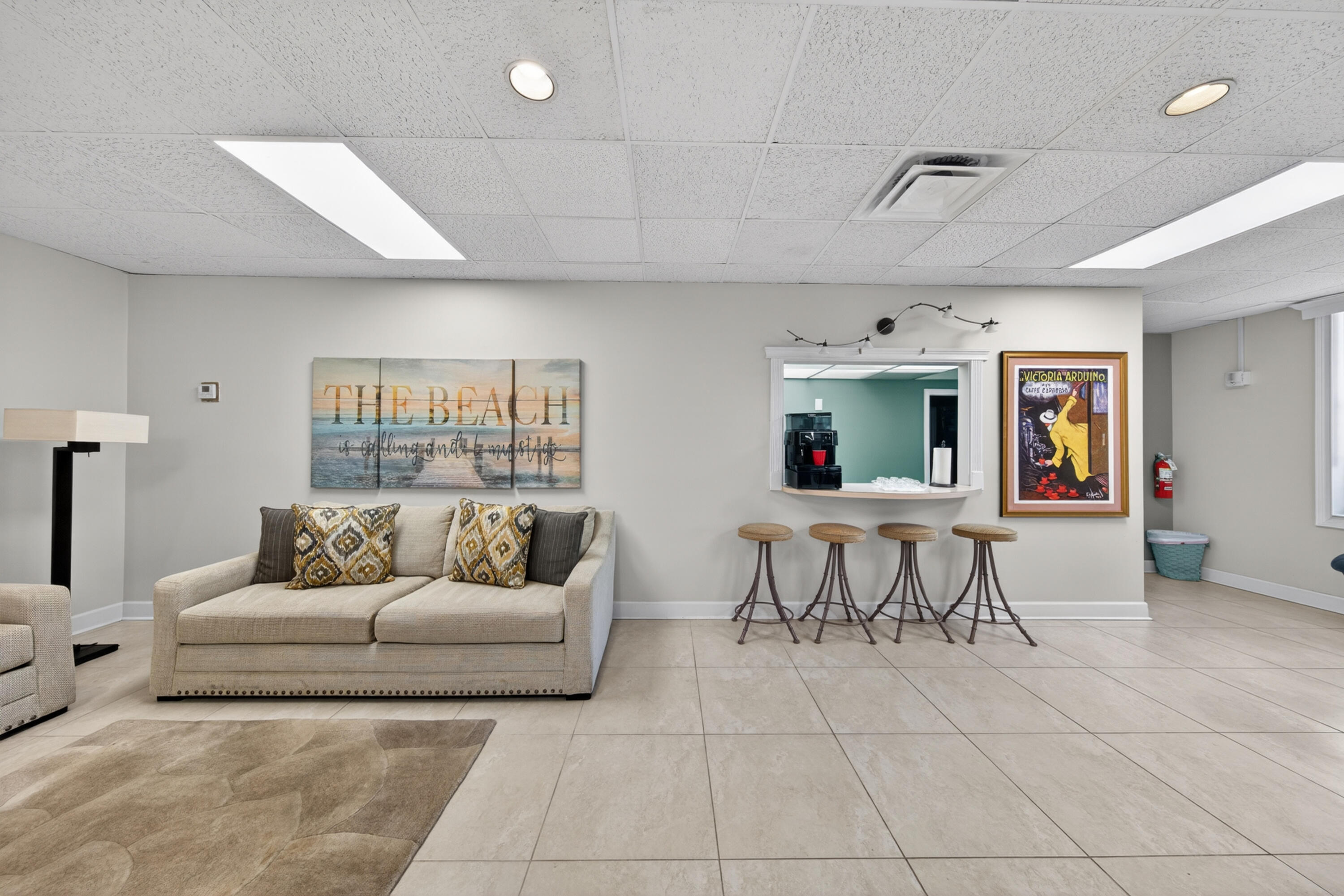 2851 South Ocean Boulevard, Unit 1N Boca Raton, FL 33432 - Photo 46 of 54 a living room with furniture and a table