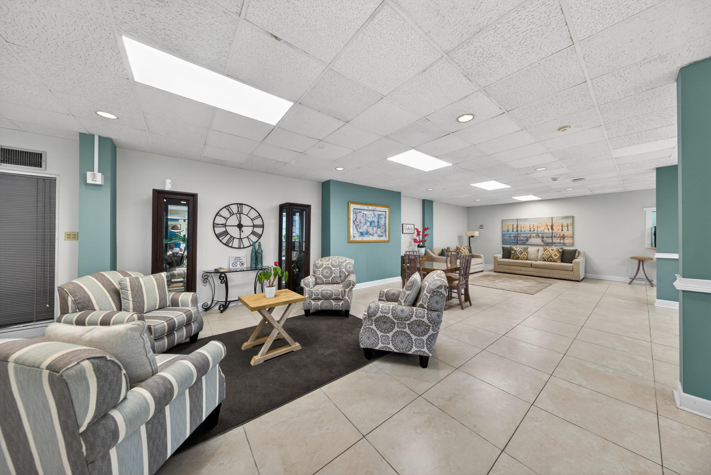 2851 South Ocean Boulevard, Unit 1N Boca Raton, FL 33432 - Photo 48 of 54 a living room with furniture and a table