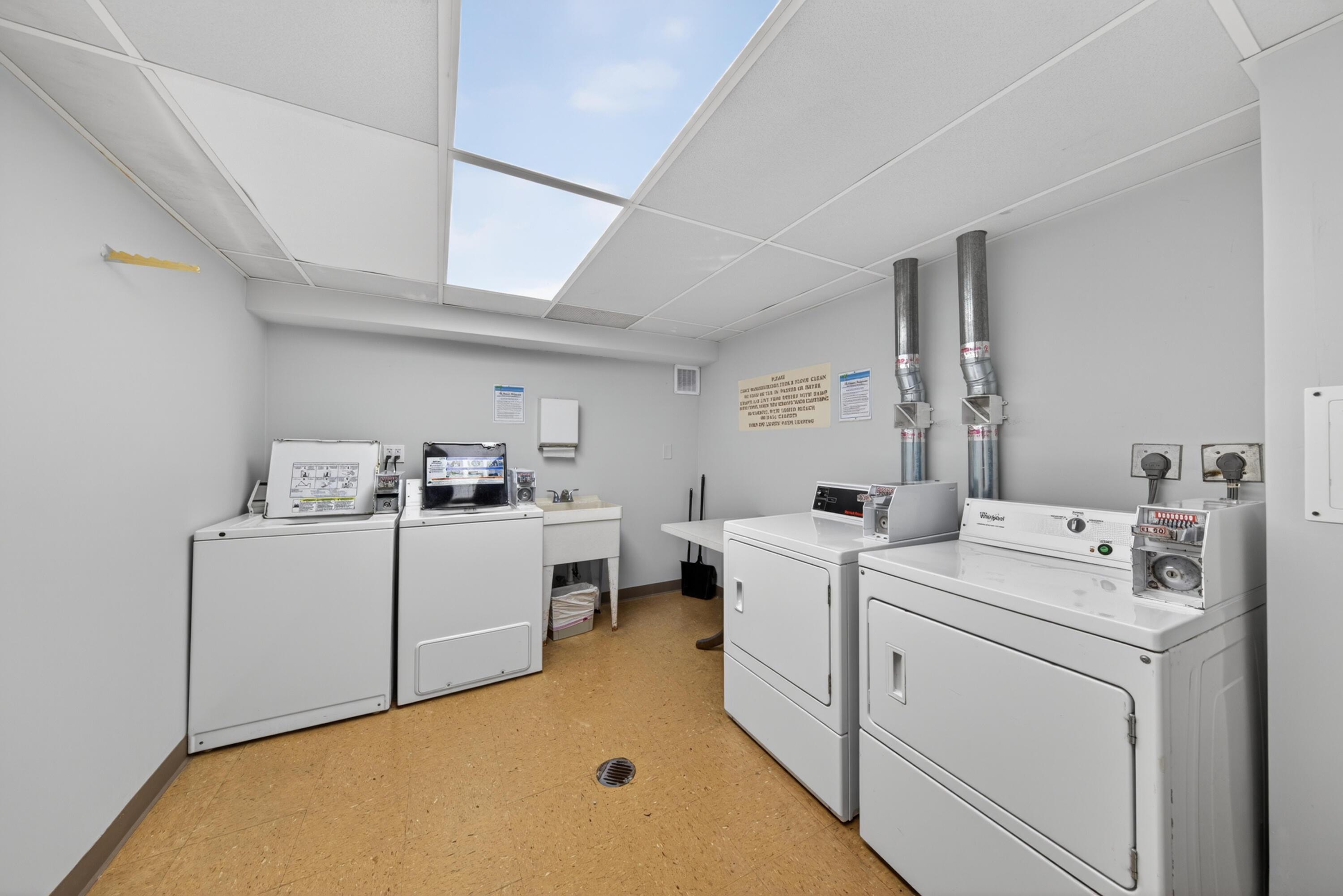 2851 South Ocean Boulevard, Unit 1N Boca Raton, FL 33432 - Photo 51 of 54 a utility room with dryer and washer