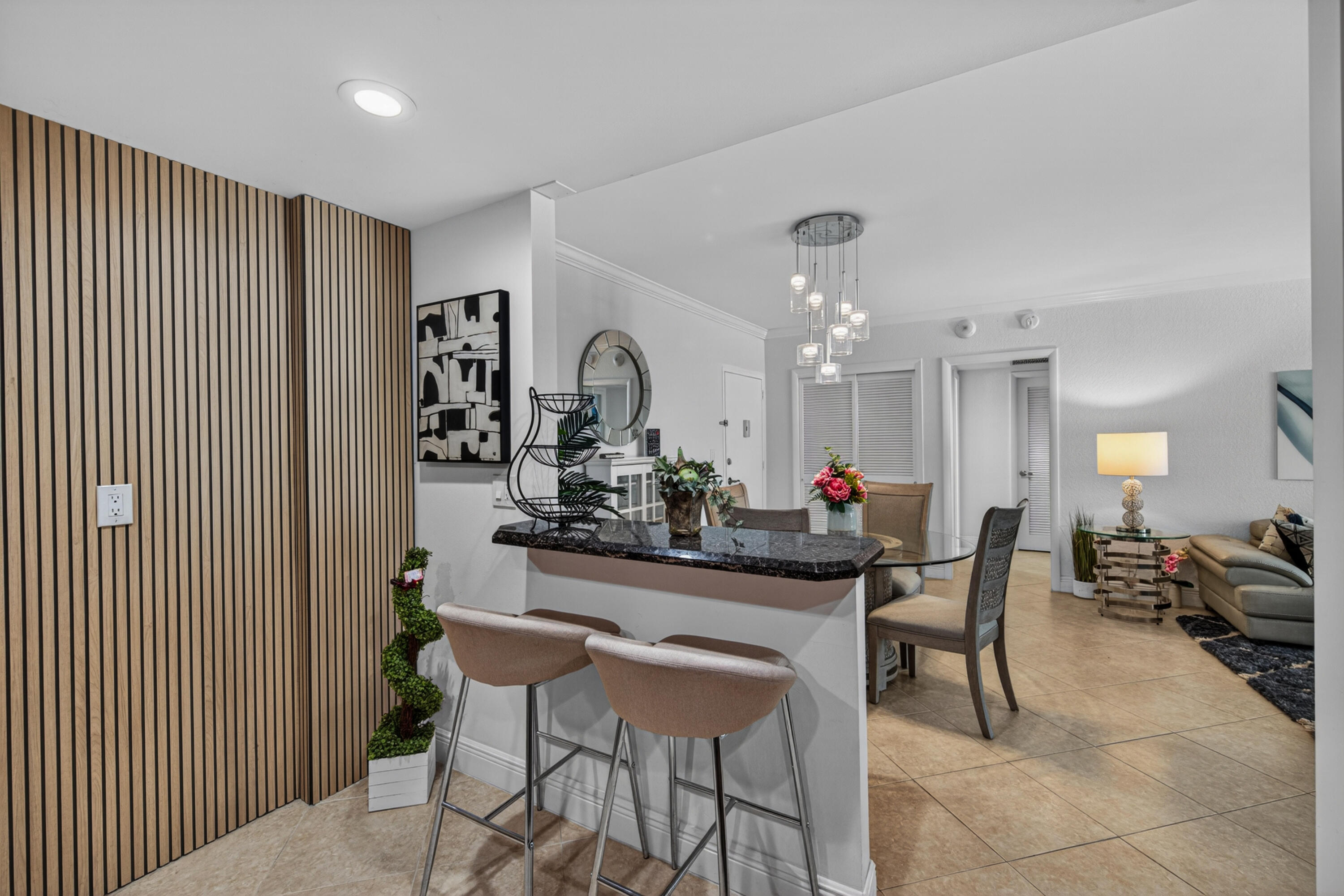 2851 South Ocean Boulevard, Unit 1N Boca Raton, FL 33432 - Photo 8 of 54 a view of a dining room with furniture