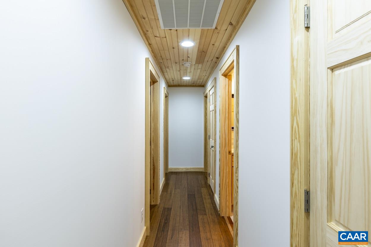 1151 Ridgeview Road Reva, VA 22735 - Photo 32 of 74 a view of hallway with wooden floor