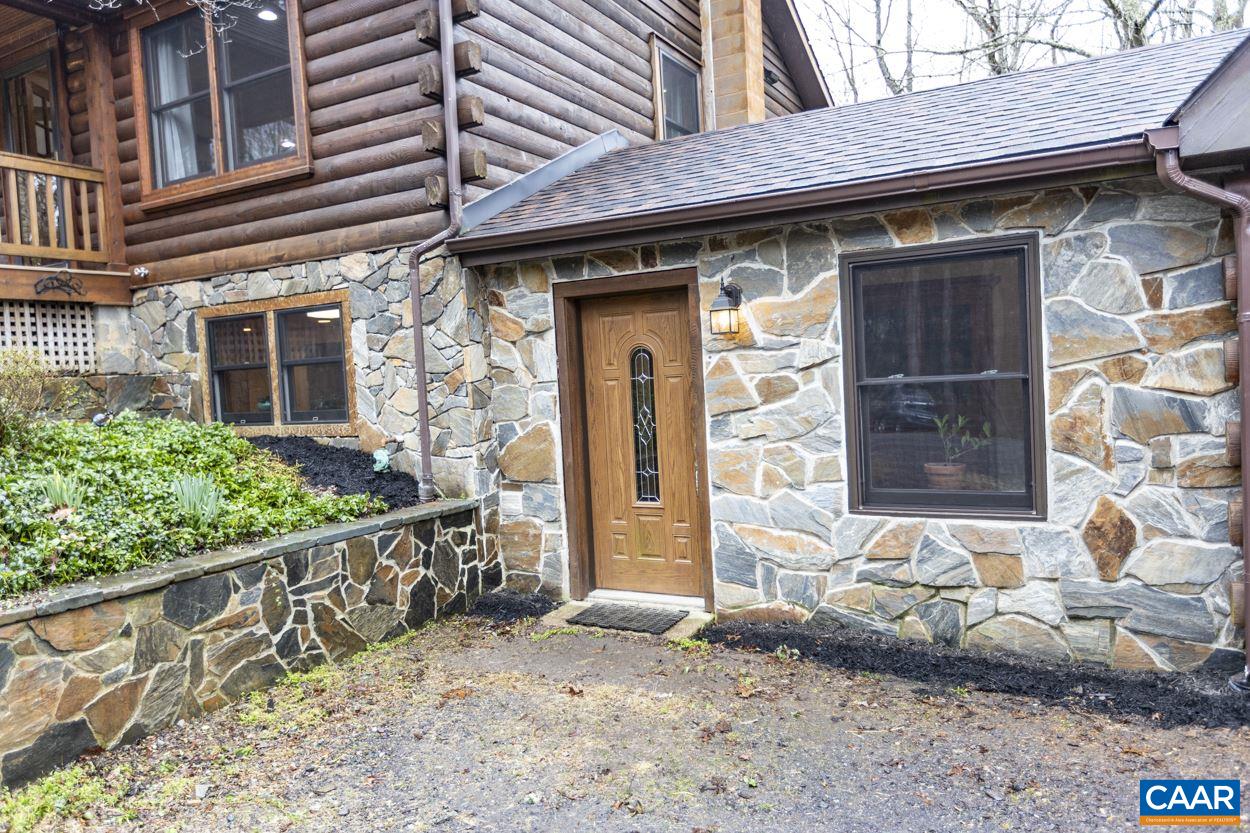 1151 Ridgeview Road Reva, VA 22735 - Photo 4 of 74 a front view of a house with a large window